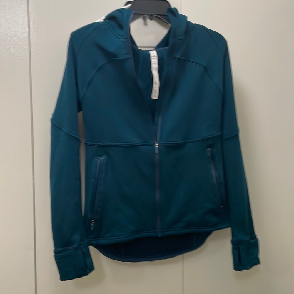 Lululemon jacket — water resistant and made for running :)